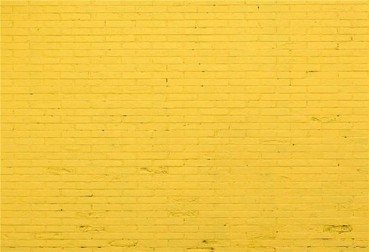 Toile de fond décors de photographie de mur de brique jaune